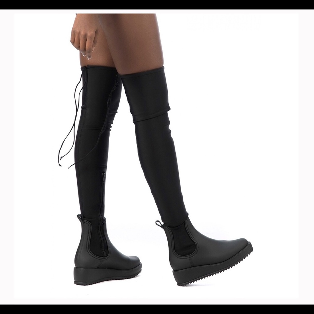 Jeffrey Campbell’s monsoon thigh high boots